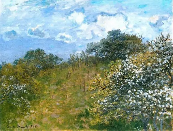 Orchard in Bloom của Claude Monet trải rộng cây lá và hoa nở, bầu trời trong sáng mang vẻ xuân dịu.