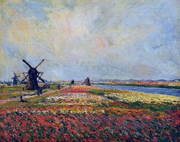 Tulip Fields in Holland của Claude Monet nổi bật cối xay gió, đồng hoa đỏ và bầu trời rộng thoáng.